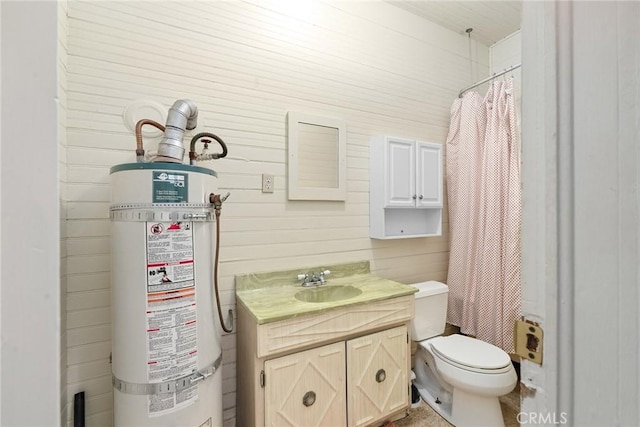 bathroom with a shower with shower curtain, vanity, water heater, toilet, and wood walls