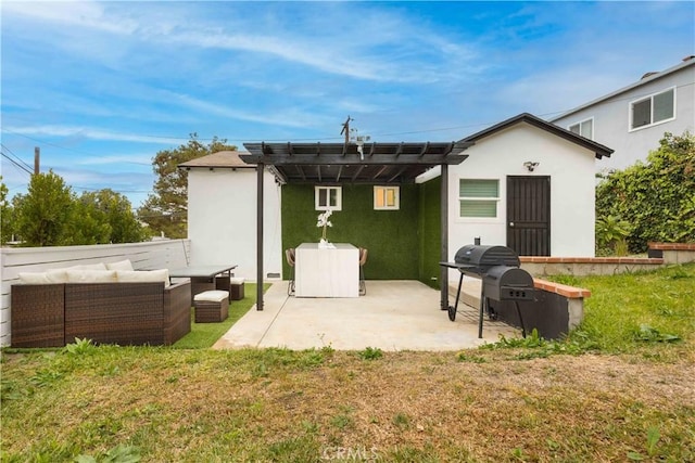 back of house featuring outdoor lounge area, a pergola, a lawn, and a patio