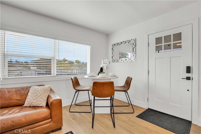 dining room featuring light hardwood / wood-style flooring