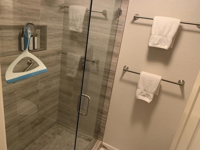 bathroom featuring walk in shower