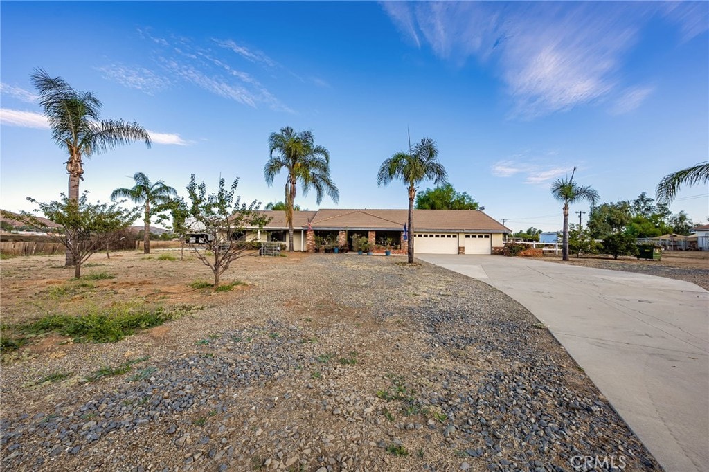 single story home featuring a garage