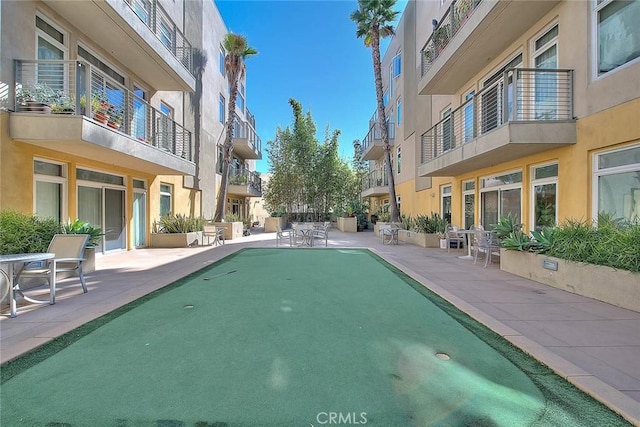 surrounding community featuring a residential view and a patio