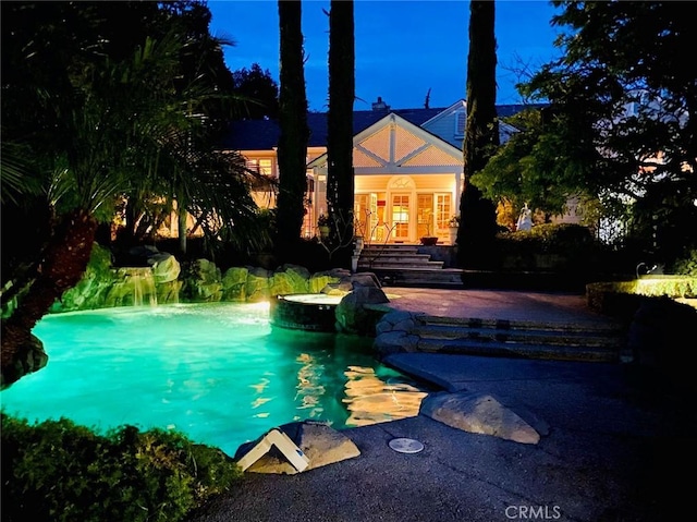 view of pool featuring a patio area