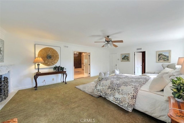 carpeted bedroom with connected bathroom and ceiling fan