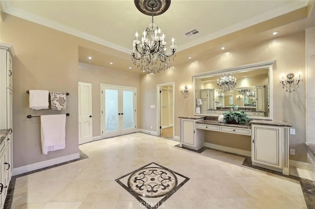 bathroom with vanity, an inviting chandelier, ornamental molding, and french doors