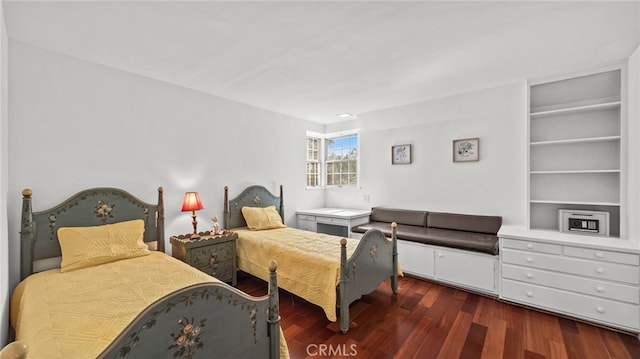 bedroom featuring dark hardwood / wood-style floors