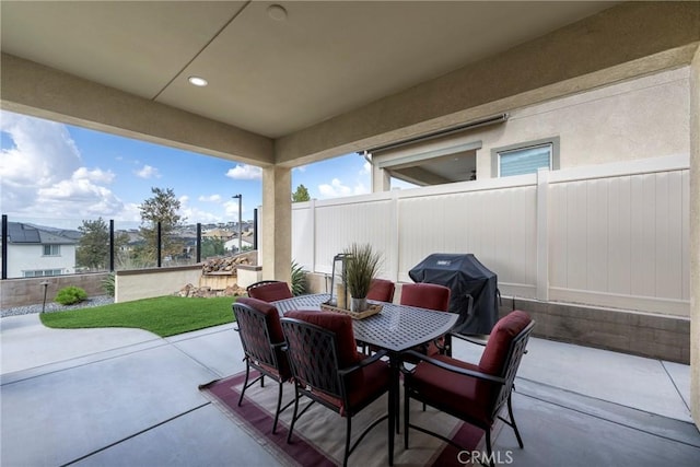 24185 Sprout Dr, Corona, CA 92883 - view of patio with outdoor dining area, a fenced backyard, and area for grilling
