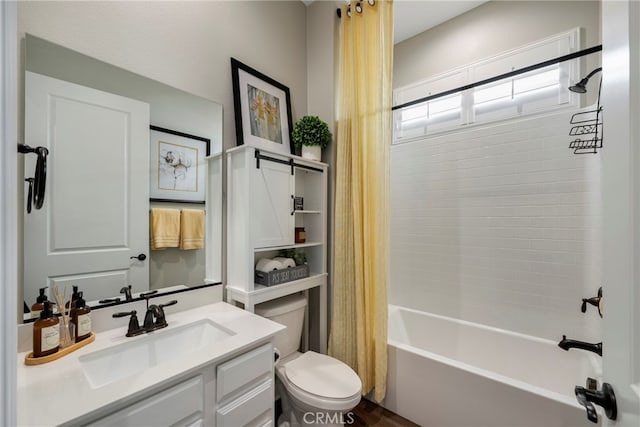 full bathroom with vanity, toilet, and shower / bathtub combination