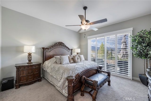 bedroom with light carpet and ceiling fan