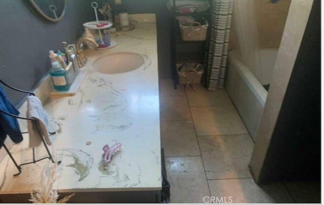 bathroom featuring vanity and shower / bath combination with curtain