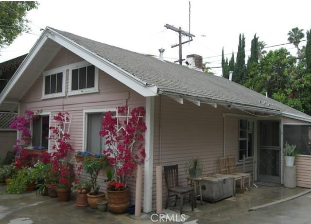 rear view of house with a patio