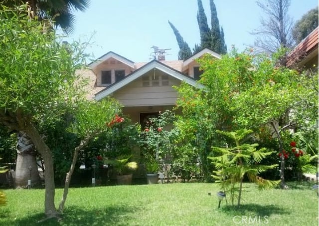 view of home's exterior featuring a yard