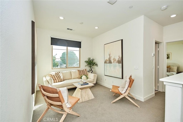 living room featuring light colored carpet