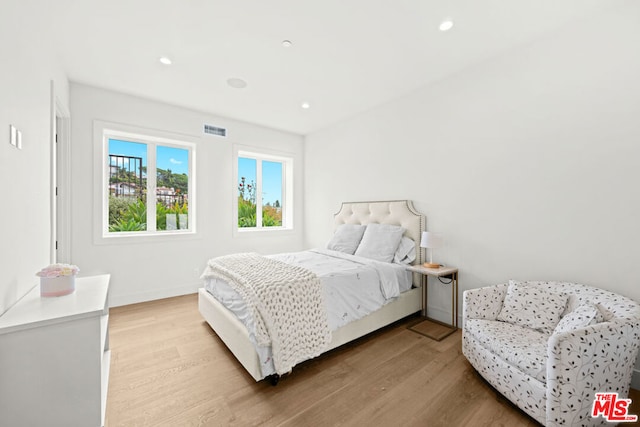 bedroom featuring light hardwood / wood-style floors