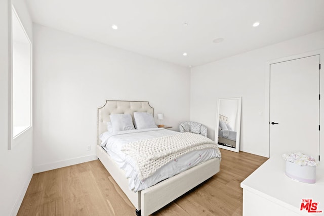 bedroom featuring light hardwood / wood-style flooring