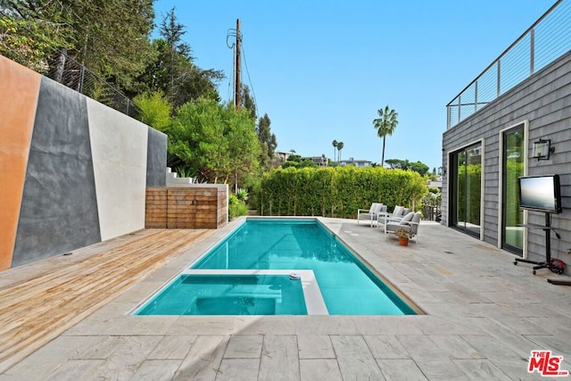 view of pool with a patio area