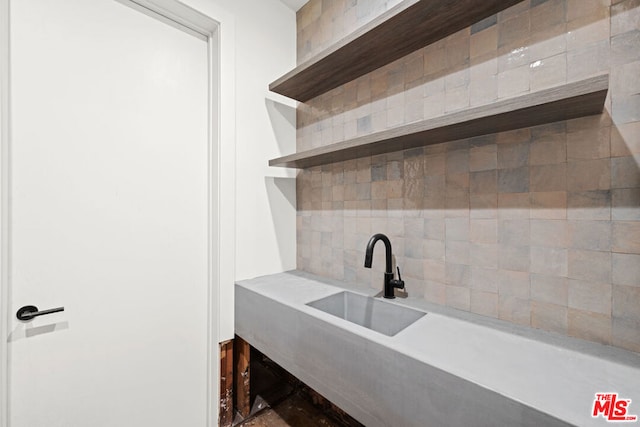 kitchen with sink and tasteful backsplash