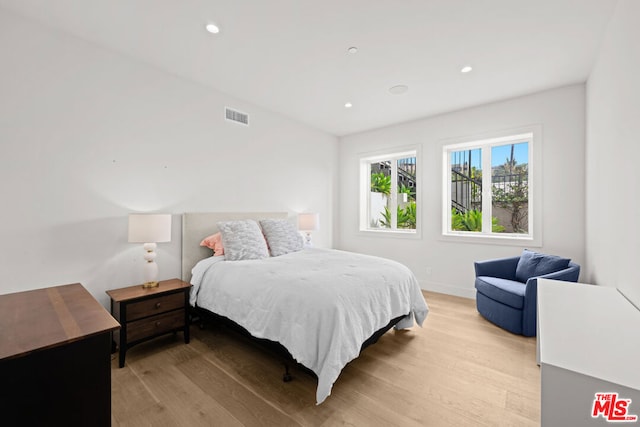 bedroom featuring light wood-type flooring