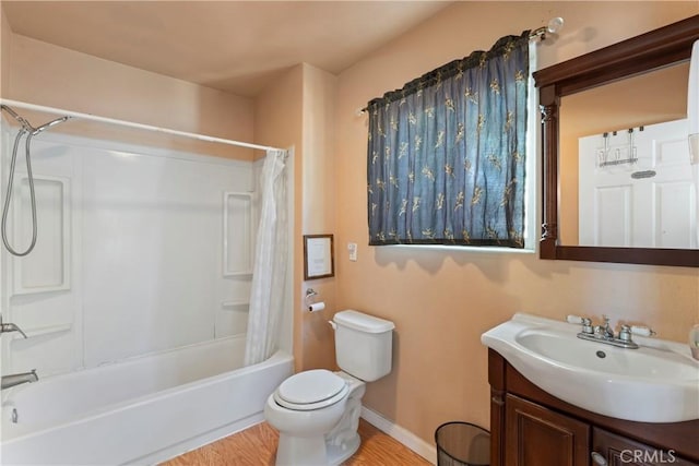 full bathroom with hardwood / wood-style floors, vanity, toilet, and shower / bath combination with curtain