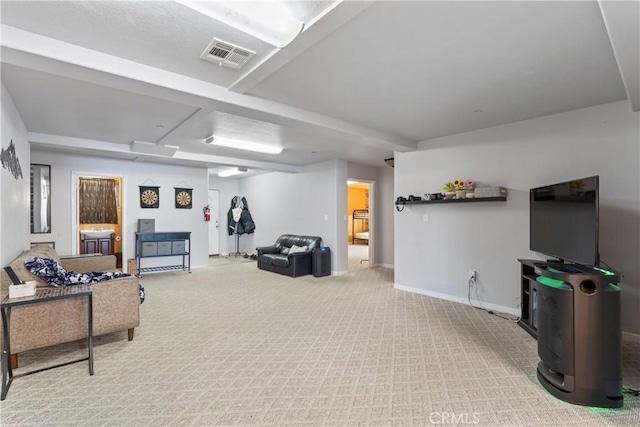 living room featuring light carpet