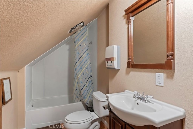 full bathroom with shower / bath combo with shower curtain, vanity, a textured ceiling, and toilet