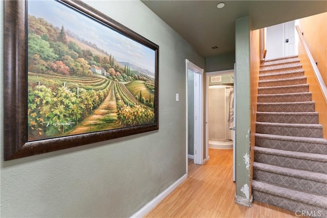 hallway featuring light hardwood / wood-style flooring