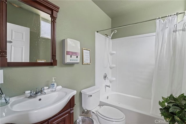 full bathroom featuring vanity, shower / bath combination with curtain, and toilet