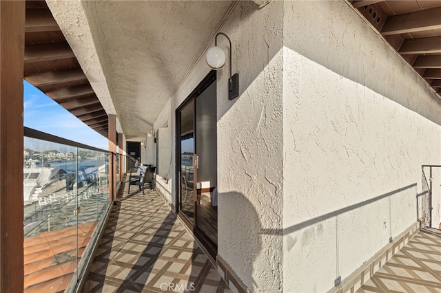 view of home's exterior with a balcony