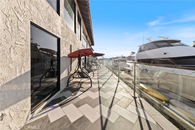 view of patio / terrace featuring a balcony