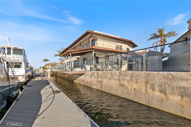 dock area with a water view