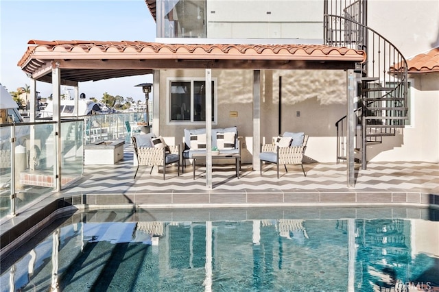 view of pool with an outdoor hangout area