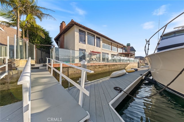 dock area featuring a water view