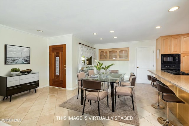 tiled dining room with crown molding