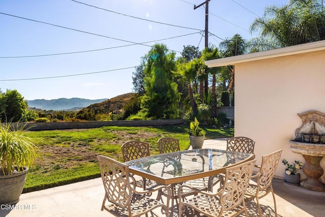 view of patio with a mountain view