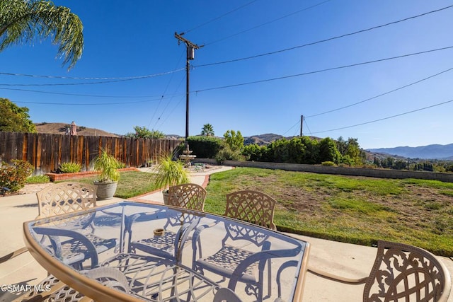 view of patio with a mountain view