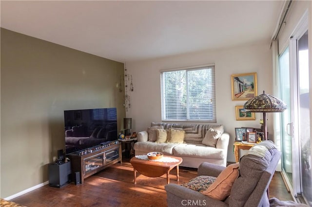 living room featuring dark hardwood / wood-style floors