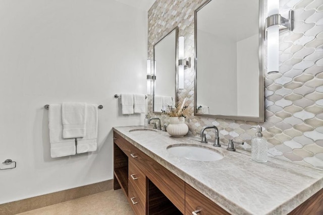 bathroom with vanity, backsplash, and tile patterned flooring