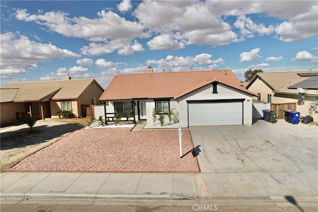 ranch-style home with a garage