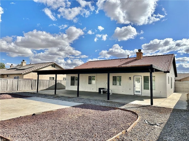 rear view of house with a patio area