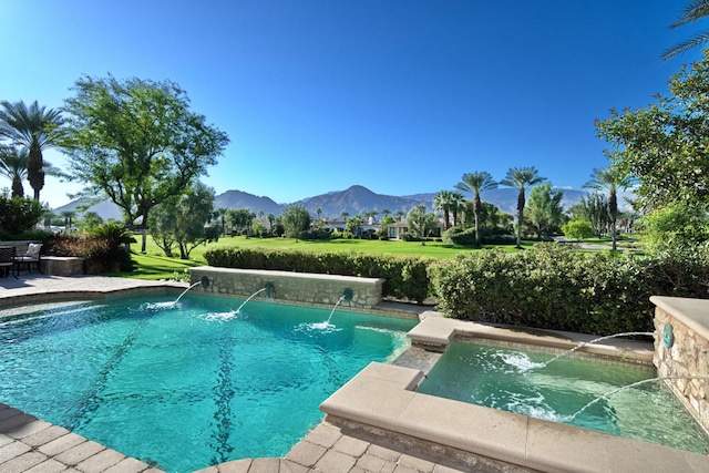 view of swimming pool featuring a mountain view and pool water feature