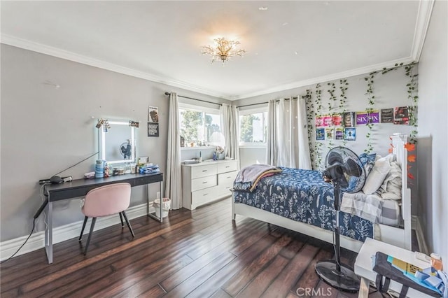 bedroom with dark hardwood / wood-style floors and crown molding