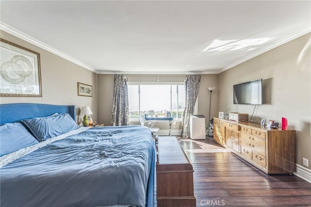 bedroom with dark hardwood / wood-style flooring and crown molding