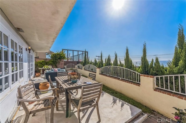 balcony featuring a patio area