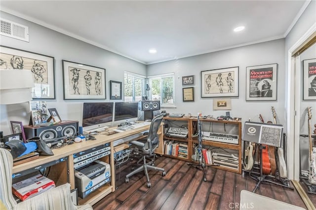 office with dark wood-type flooring and ornamental molding