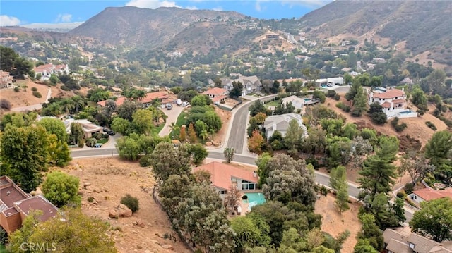 bird's eye view with a mountain view