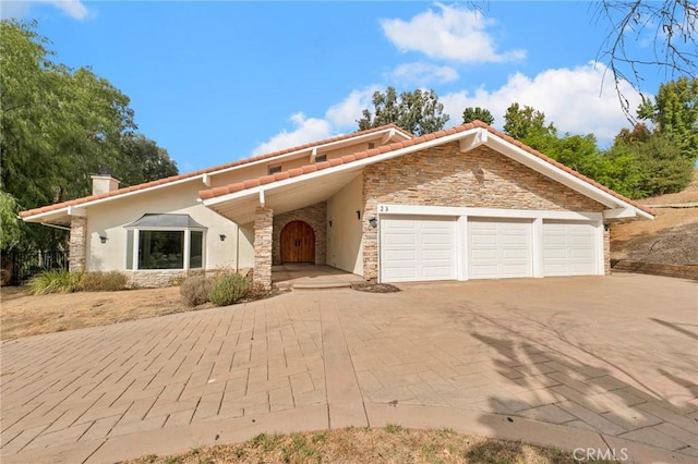 view of front of property featuring a garage