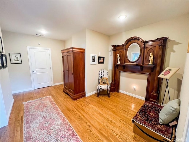 living area featuring light hardwood / wood-style flooring