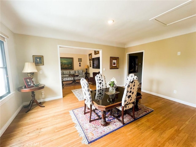 dining room with light wood-type flooring