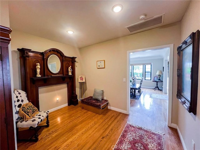 living area featuring light hardwood / wood-style flooring