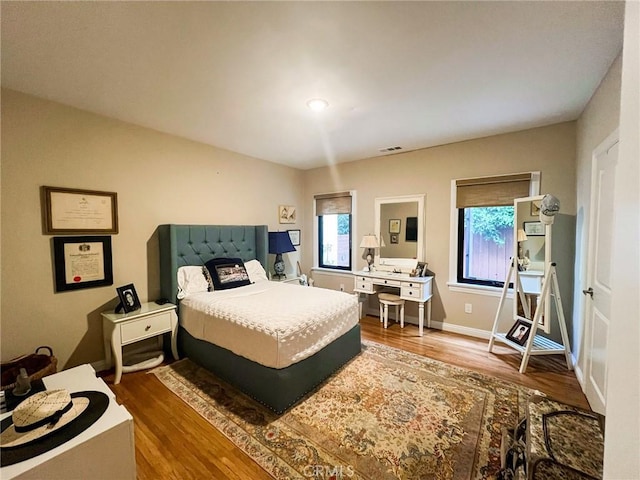 bedroom featuring hardwood / wood-style flooring